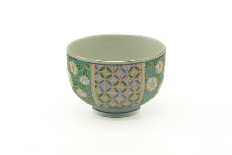 The Arita yunomi rotated slightly, showing the patterned band of green florals and blue geometric design