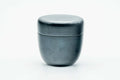 Weathered black-lacquer matcha tea caddy, lid on, three-quarter view