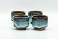 Tezumi — Japanese Teacups - Set of 4 Blue Hare's Fur Drip-Glazed Agano-yaki Guinomi - 35ml — front view
