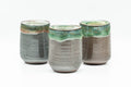 Tezumi — Japanese Teacup - Set of 3 Triangular-Shaped Green Drip-Glazed Yunomi - 90ml — front view