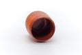 Tezumi — Japanese Teacup - Orange Shino Glazed Mino Yunomi - 100ml — three-quarter view