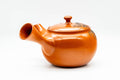 Rear three-quarter view of the rounded red shudei teapot body.