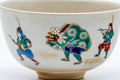 Tezumi — Japanese Matcha Bowl - Parading Musicians Kyo-yaki Chawan - 200ml — inverted showing the foot ring