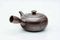 Purple-brown Banko-yaki kyusu, three-quarter view from the rear with the handle to the right