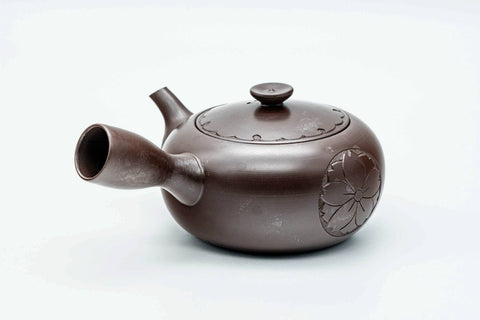 Purple-brown Banko-yaki kyusu, three-quarter view from the rear with the handle to the right