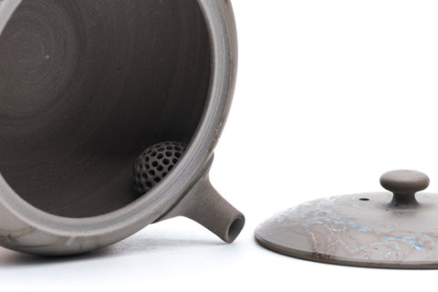 Mogake yakishime unglazed Tokoname kyusu teapot with side handle - lid removed beside the body showing the interior