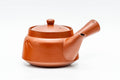 Red shudei Tokoname kyusu teapot, front view with lid on, showing the engraved bamboo motif and side handle