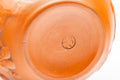 Tezumi — Japanese Teacup - Floral Sculpted Red Shudei Tokoname-yaki Yunomi - 125ml — inverted showing the foot ring