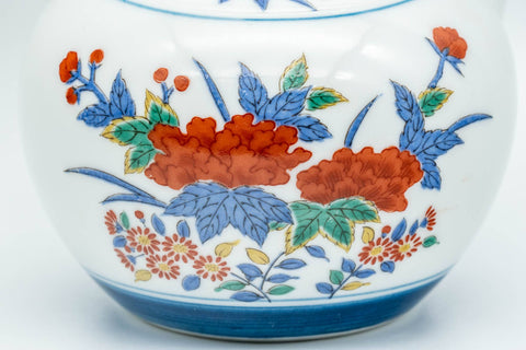 Japanese Tea Set - Floral Arita-yaki Debeso Kyusu Teapot with 5 Yunomi Teacups - closeup of the red floral pattern on the body