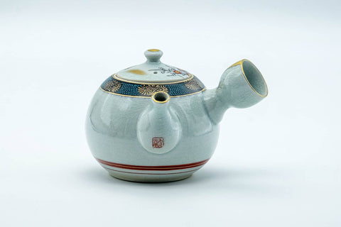 Tezumi — Japanese Tea Set - Villager Decorated Kutani-yaki Kyusu Teapot with 3 Lidded Yunomi Teacups — the teapot side view with the handle