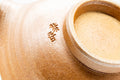 Tezumi — Japanese Katakuchi - Celadon Glazed Stoneware Water Cooler - 150ml — closeup of the foot