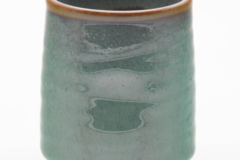 Tezumi — Japanese Teacup - Teal Speckled Thumb-Indented Yunomi - 180ml — closeup of the glaze