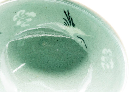 Tezumi — Japanese Matcha Bowl - Green Celadon Glazed Floral Egret Chawan - 150ml — tipped to show the interior