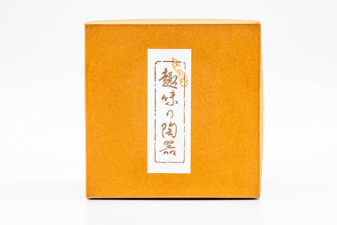 The wooden tomobako box with brushed calligraphy