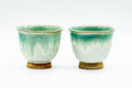 The two Agano-yaki cups viewed from a slightly different front angle