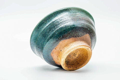 Underside three-quarter view revealing the unglazed foot ring and base.