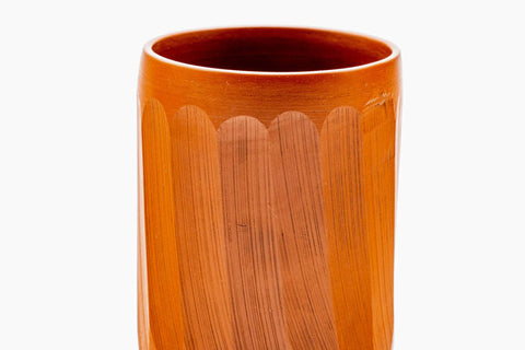 Overhead view into the cup, showing the glazed interior and faceted rim.