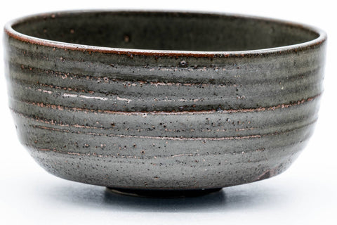 Tezumi — Japanese Matcha Bowl - Dark Green Spiraling Wabi-Sabi Chawan - 300ml — tipped to show the interior