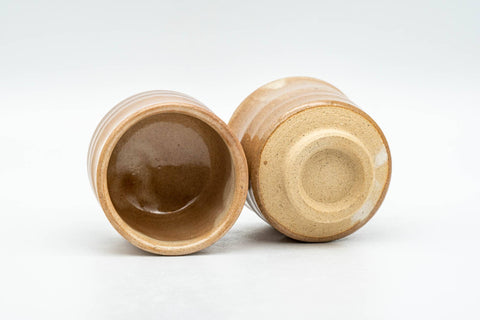 Tezumi — Japanese Teacups - Pair of Milky Beige Drip-Glazed Hagi-yaki Guinomi - 50ml — three-quarter view