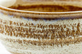 Three-quarter closeup of the chawan showing the glaze transition and rim