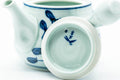 Japanese Kyusu - Blue Floral Arita-yaki Ceramic Filter Teapot - 400ml - interior view with the lid removed, showing the perforated ceramic filter and blue painted mark