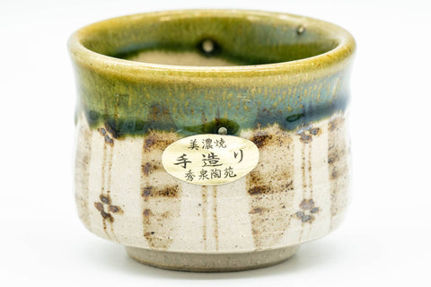 Japanese Teacup - Floral Green Drip-Glazed Oribe-yaki Guinomi - 50ml - closeup of the green drip-glaze and floral decoration