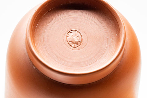 Tezumi — Japanese Teacup - 秋景 Shūkei - Tall Plum Blossoms Yellow Striped Tokoname-yaki Yunomi - 140ml — closeup of the glaze