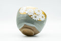 Japanese Matcha Bowl - White Floral Gold Green Glazed Wan-nari Chawan - 350ml - tilted view showing the foot and floral decoration