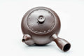Overhead view of the Banko-yaki kyusu showing the lid knob and engraved motif on the shoulder