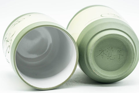 Japanese Teacups - Pair of Friendly Mice Ryokudei Tokoname-yaki Yunomi - 140ml - the pair tilted showing the white inner glaze and base