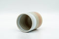 Tezumi — Japanese Teacup - Beige White Peach Tsutsu-gata Hagi-yaki Yunomi - 125ml — three-quarter view