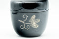 Japanese Natsume - Gold Floral Black Lacquer Matcha Tea Caddy - 80ml - closed caddy, front view of the gold floral motif on black lacquer