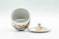 Japanese Teacup - Floral Kutani-yaki Ryuzan Lidded Yunomi - 60ml - top-down view into the open cup with the lid beside it showing the white interior