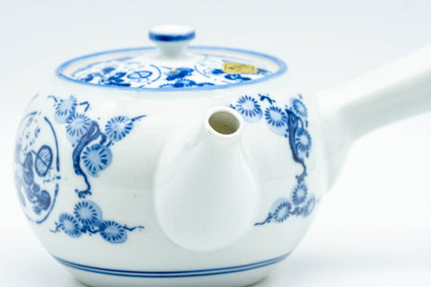 Tezumi — Japanese Kyusu - Flowers and Villagers Porcelain Arita-yaki Debeso Teapot - 300ml — side profile showing the spout and handle