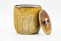 Three-quarter view of the water jar with the lid in place.
