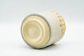 Japanese Teacup - Beige Yellow Drip-Glazed Yunomi - inverted to show the unglazed foot