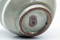 Close-up of the base and foot with a red maker's seal.