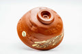 Inverted view of the Tokoname nerikomi chawan showing the carved foot and underside