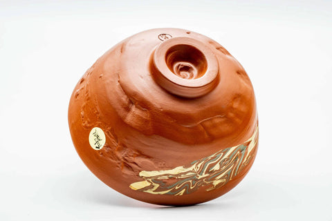 Inverted view of the Tokoname nerikomi chawan showing the carved foot and underside