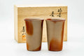 Pair of tall orange Bizen-yaki yunomi teacups shown with their wooden presentation box.