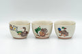 Tezumi — Japanese Teacups - Set of 10 Uniquely Decorated Kutani-yaki Guinomi - 40ml — front view from another angle