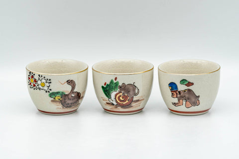 Tezumi — Japanese Teacups - Set of 10 Uniquely Decorated Kutani-yaki Guinomi - 40ml — front view from another angle