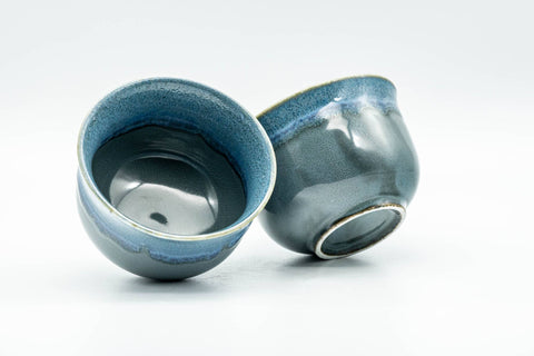 Japanese Teacups - Pair of Glossy Blue Drip-Glazed Yunomi - 140ml - cups tilted to show the glazed interior and base