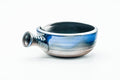 Three-quarter view showing the side handle and layered blue glaze.