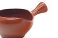 Tezumi — Japanese Yuzamashi - Smooth Red Shudei Water Cooler - 410ml — closeup of the glaze
