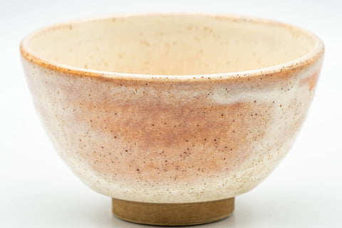 Japanese Teacups - Pair of Blush Orange and White Shino Glazed Yunomi - 120ml - closeup front view of one teacup's shino glaze