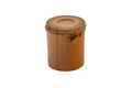 Side view of the bamboo futaoki showing the natural grain and a fine vertical split down the cylinder.