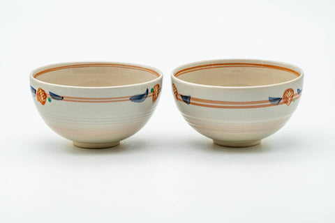 The two cups from another angle, highlighting the striped decoration.
