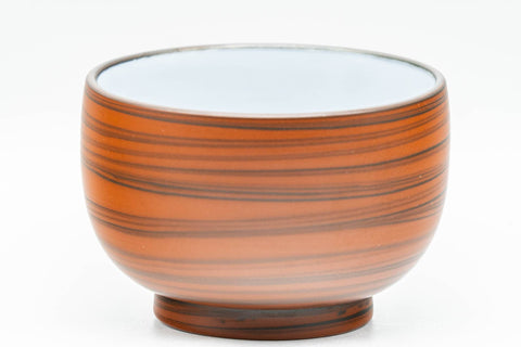 Tezumi — Japanese Teacup - Red Nerikomi White Inner Glazed Tokoname-yaki Yunomi - 90ml — tipped to show the interior