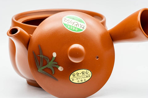 Japanese Kyusu - Yellow Flowers Tokoname-yaki Mesh Teapot - 400ml - side view of the floral-decorated body with the side handle